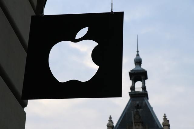 apple store logo in front of church