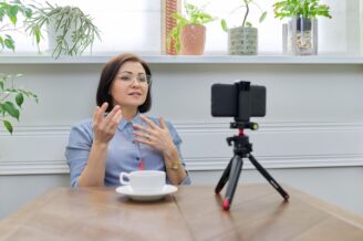 Business woman recording sales video for prospecting